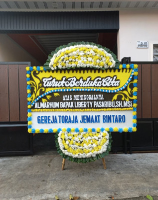 Papan Bunga Duka di Kotokociak Kubu Tapakrajo